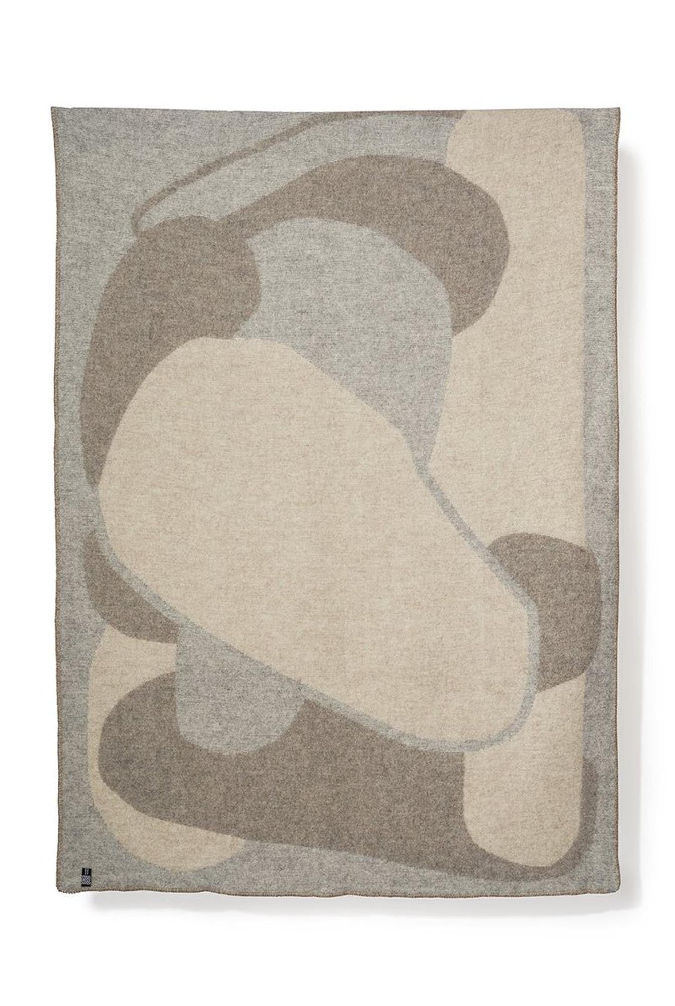 Wolldecke Heroes von ZigZagZurich: Kunstvolle Wärme für Ihr Zuhause.