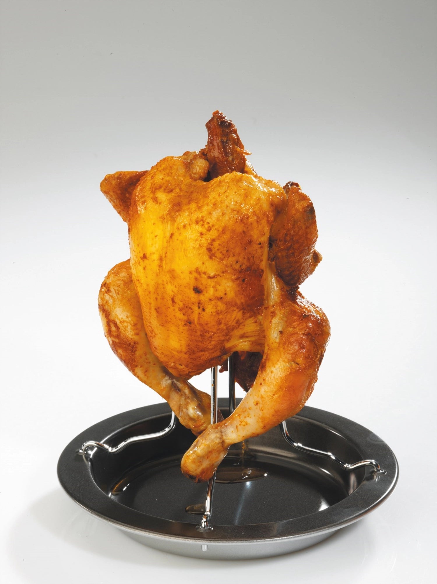 Hähnchengriller von Westmark, 21x21x21 cm, ideal für saftiges Grillen von Hähnchen, robustes Design für perfekte Ergebnisse.