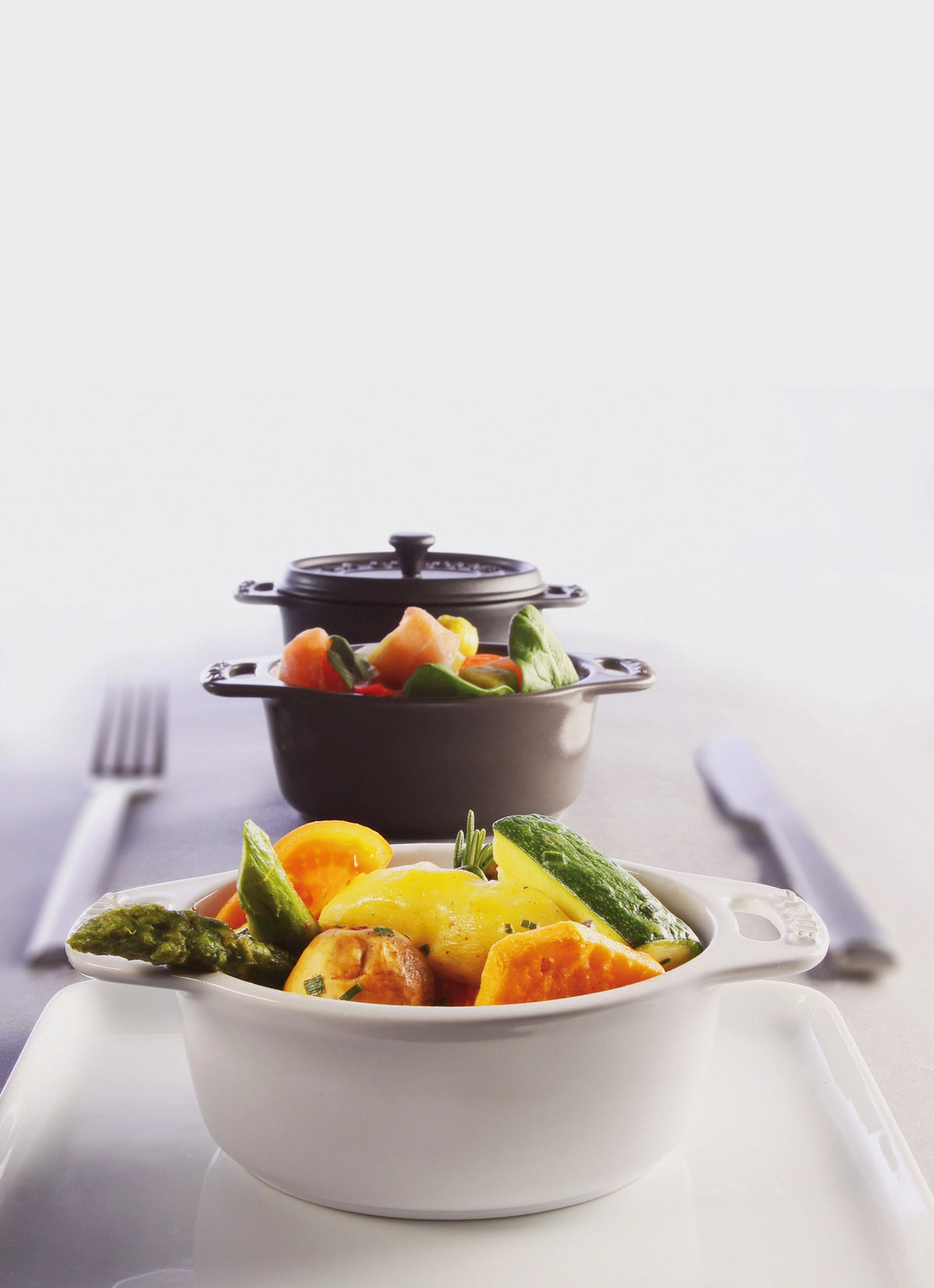 Mini Cocotte rund 0.25l in Grau präsentiert im Onlineshop von KAQTU Design AG. ist von Staub