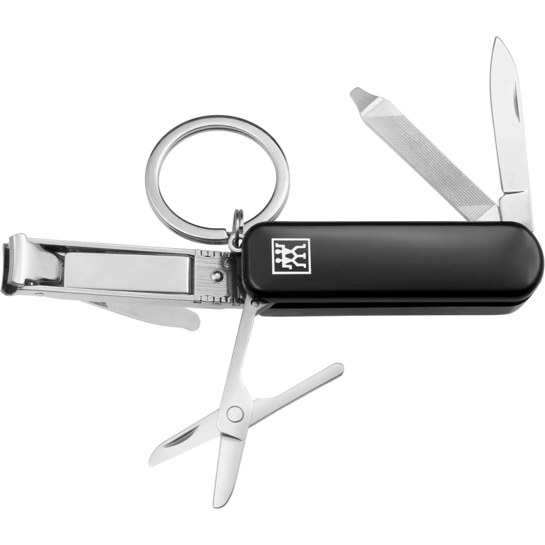 Elegantes schwarzes Lederetui mit drei Fächern und einem multifunktionalen Werkzeug, ideal für die Körperpflege auf Reisen von Zwilling Beauty.