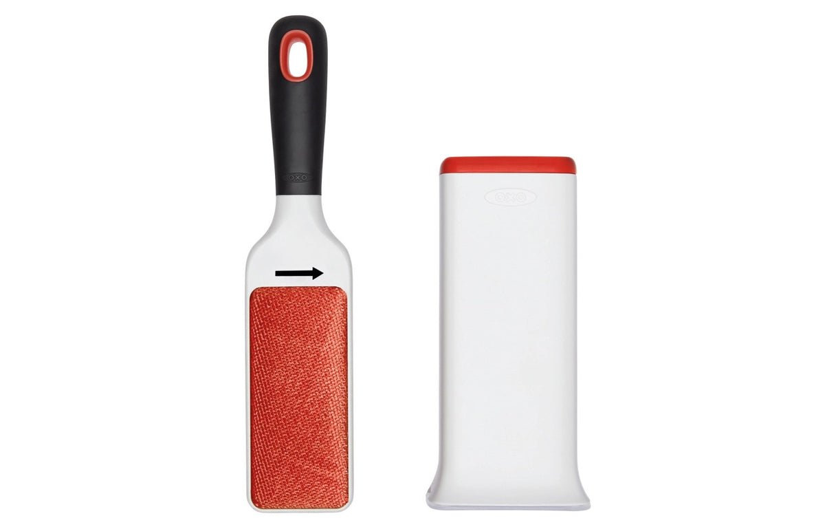 Flusenentferner-bürste für Kleider, weissorange in Orange präsentiert im Onlineshop von KAQTU Design AG. Besen ist von OXO