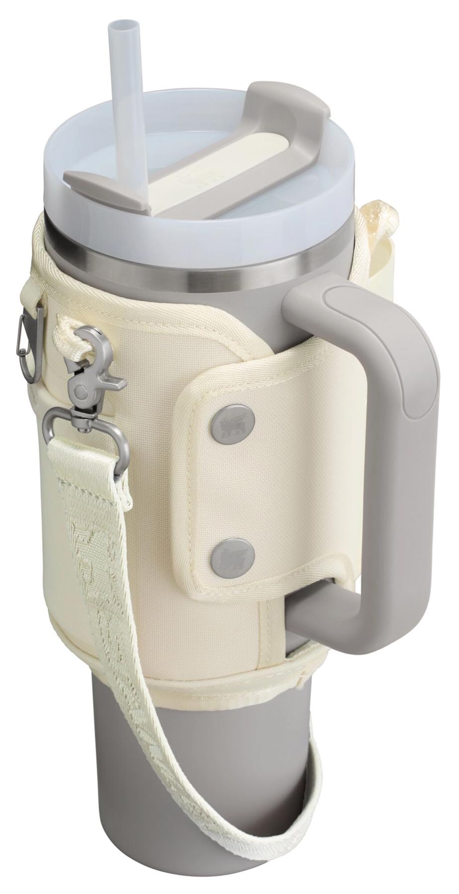 Stilvolle beige Stanley Thermosflasche mit 1,18 l Volumen, ideal für unterwegs und sorgt für die perfekte Temperatur deiner Getränke.