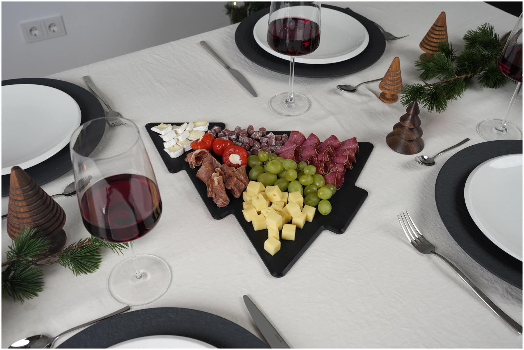 Elegantes schwarzes Servierbrett in Tannenbaum-Form aus langlebigem Duracore, ideal für stilvolles Anrichten und Servieren von Speisen.