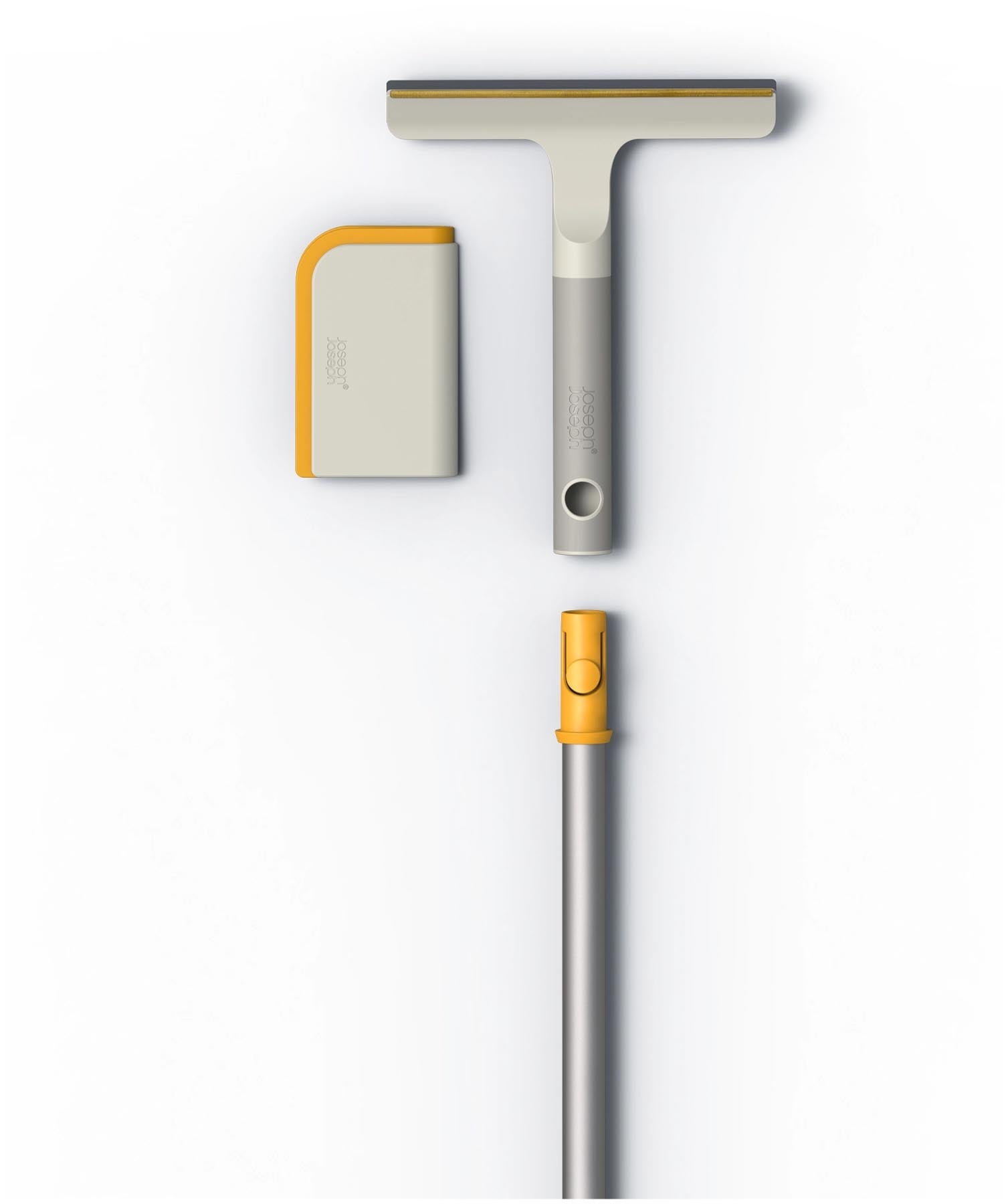 Zwei innovative Reinigungsgadgets von Joseph Joseph für Teppiche und Polster in elegantem Grau, ideal für eine gründliche und einfache Reinigung.