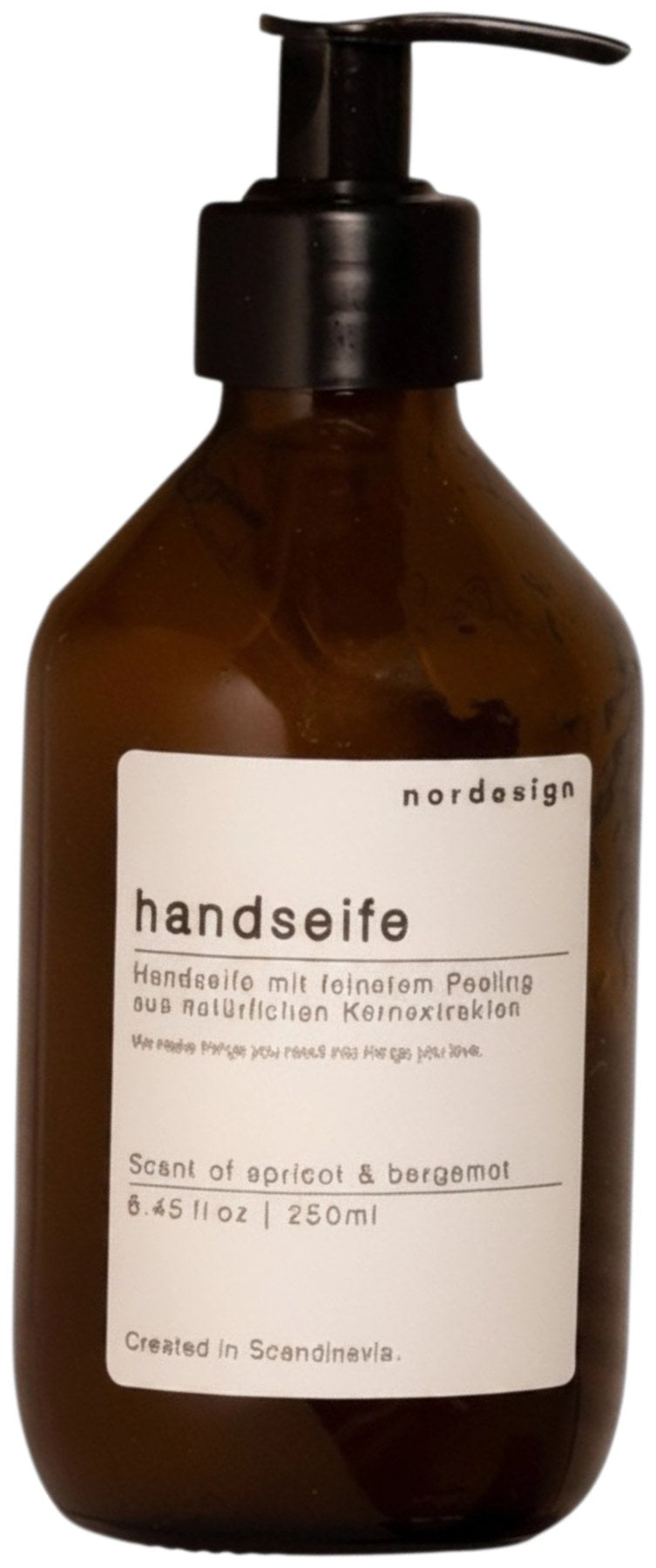 Braune Handseife im Spender, 250ml, Duft Apricot & Bergamot, Masse 6x6x18cm, Marke Nordesign, mit Peeling-Effekt aus Oliven-Kernextrakten.