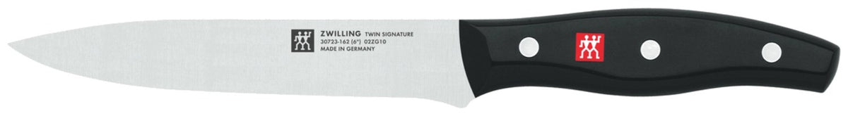 Zwilling Signature Messerblock aus Birkenholz mit fünf Edelstahlmessern, Vielzweckschere und Tranchiermesser, Griffe im Drei-Nieten-Design.