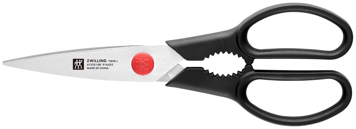 Zwilling Signature Messerblock aus Birkenholz mit fünf Edelstahlmessern, Vielzweckschere und Tranchiermesser, Griffe im Drei-Nieten-Design.