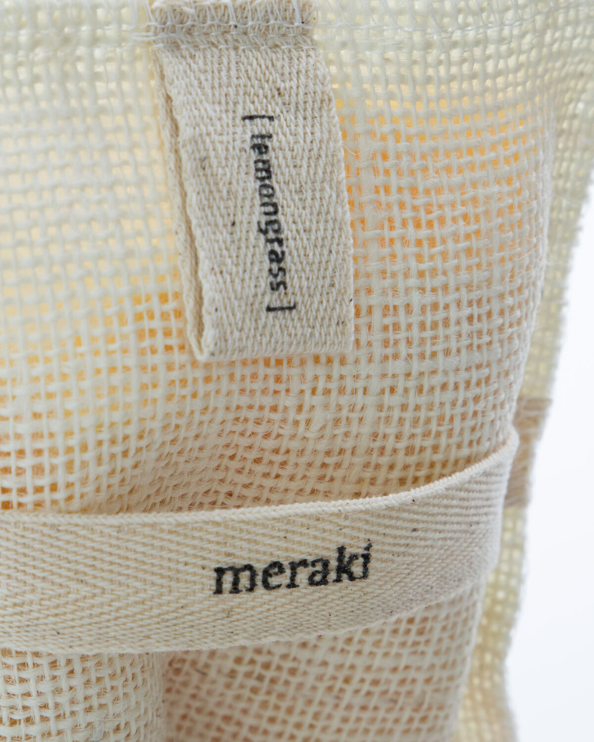 Erleben Sie erfrischende Körperpflege mit dem Lemongrass-Badewaschhandschuh von Meraki, der sanft reinigt und belebt.