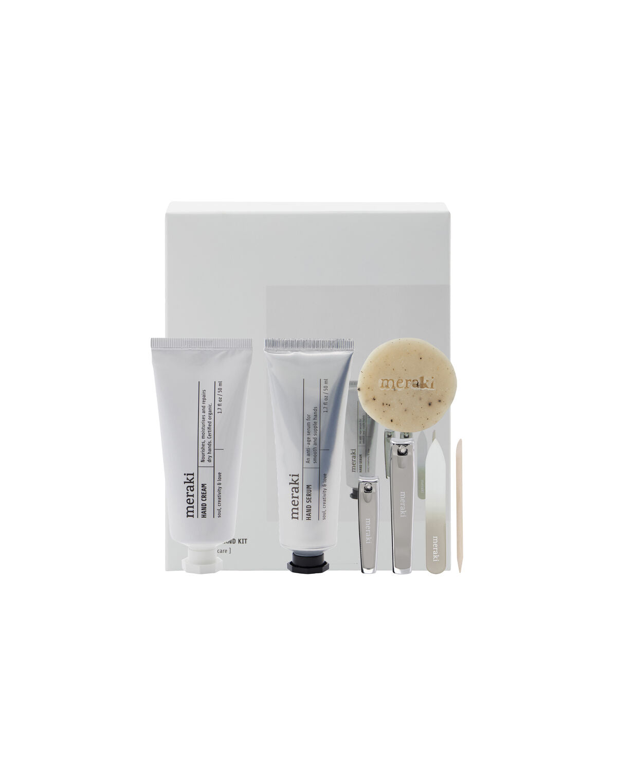 Elegante Geschenkbox mit luxuriösen Pflegeartikeln: Handcreme, Handserum, Seife und Nagelset von Meraki für eine verwöhnende Handpflege.