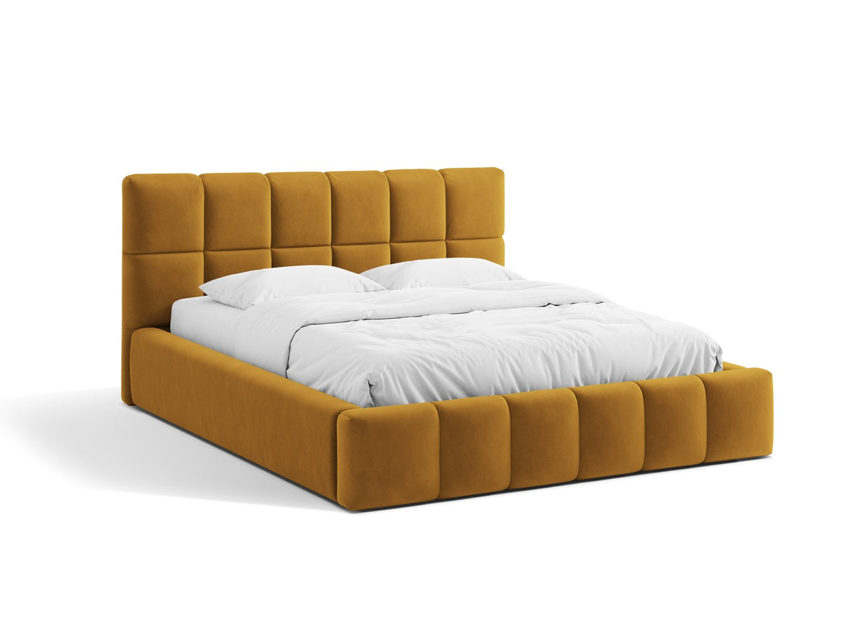 Bellis Ablagebett mit Kopfteil von Micadoni in Gelb, Bezug aus Bluvel-Stoff, schwarze Kunststoffbeine, gepolstertes Kopfteil mit Ziernähten.