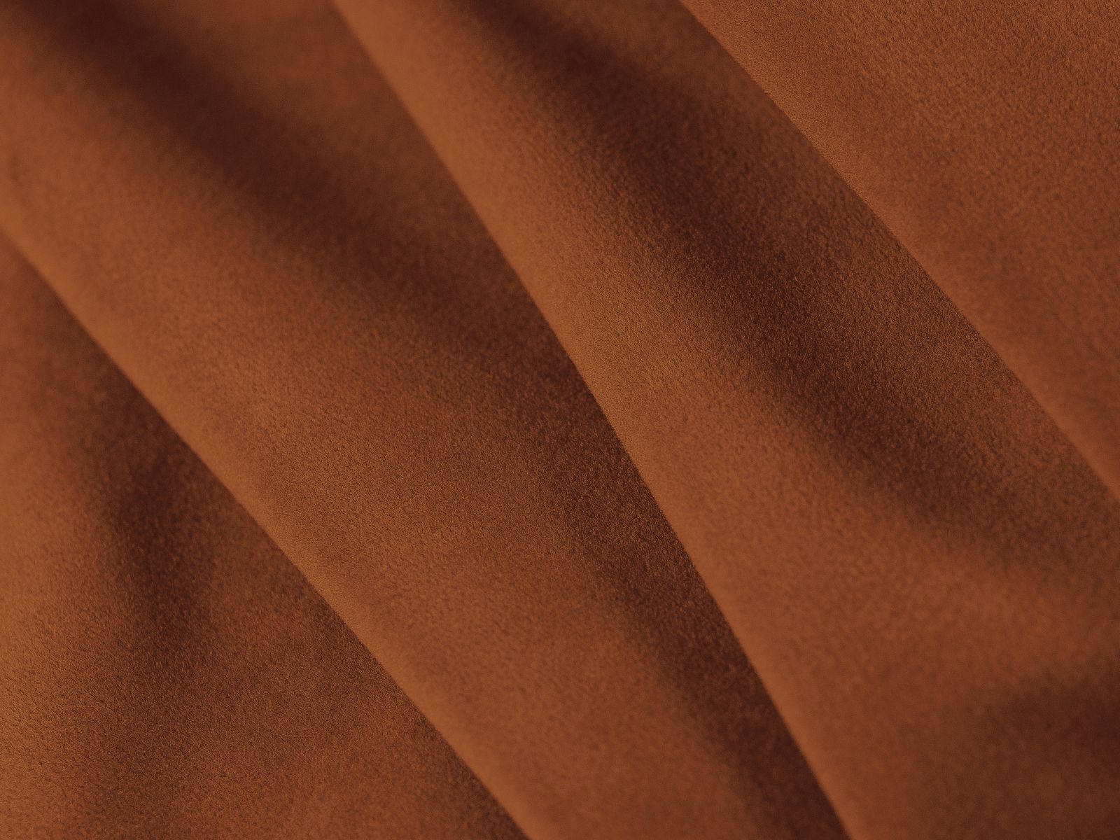 Modernes 3-Sitzer Sofa Dreamy in sanftem Terracotta, perfekt für gemütliche Abende und als praktisches Schlafsofa für Gäste.