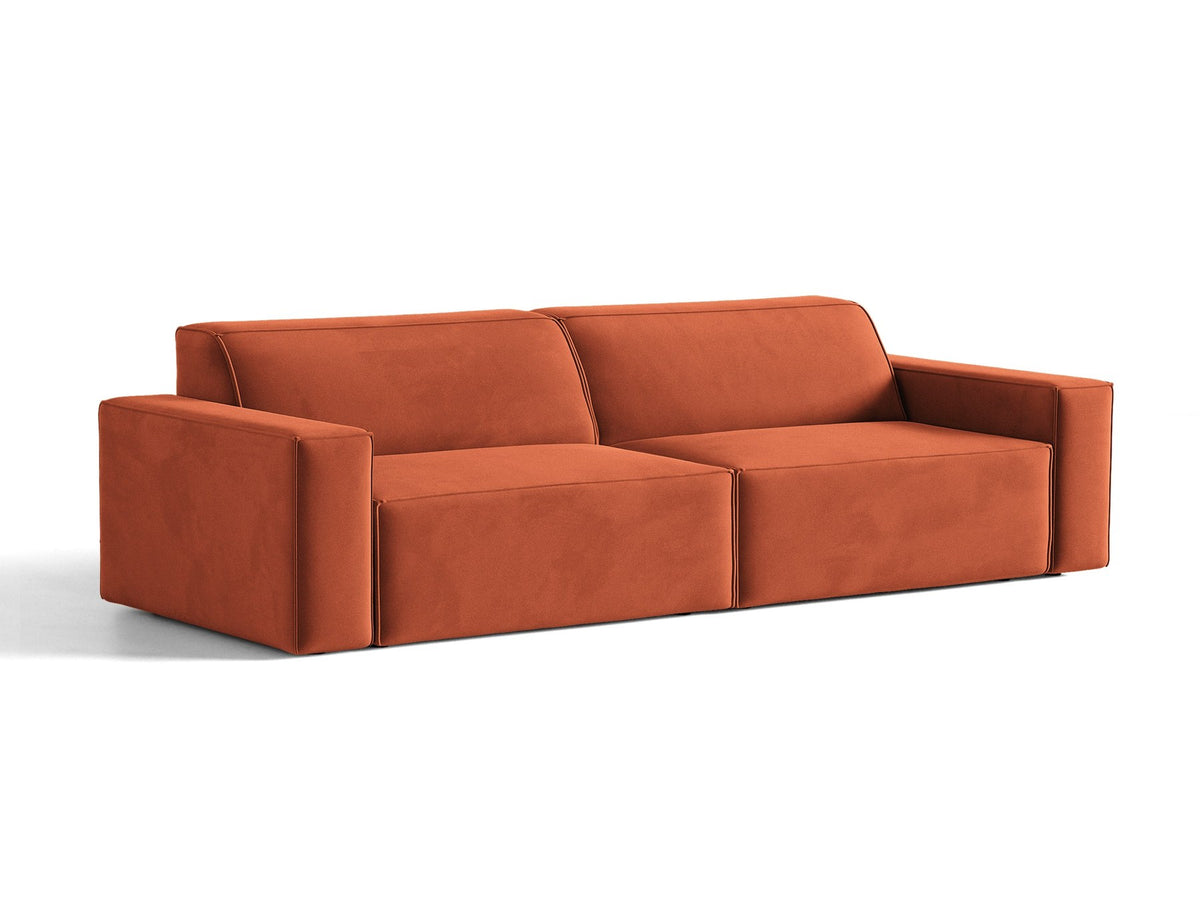 Modulares 4er Sofa Jodie von Micadoni in leichtem Beige mit Venus Samtstoff, schwarzen Kunststoffbeinen und niedriger Rückenlehne.