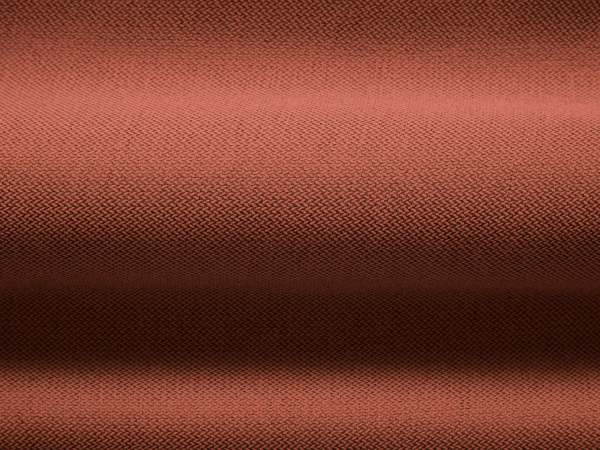 Beige Armsessel Abby von Micadoni mit strukturiertem Heritage-Stoffbezug, schwarzen Kunststoffbeinen und runder, kompakter Formgebung.