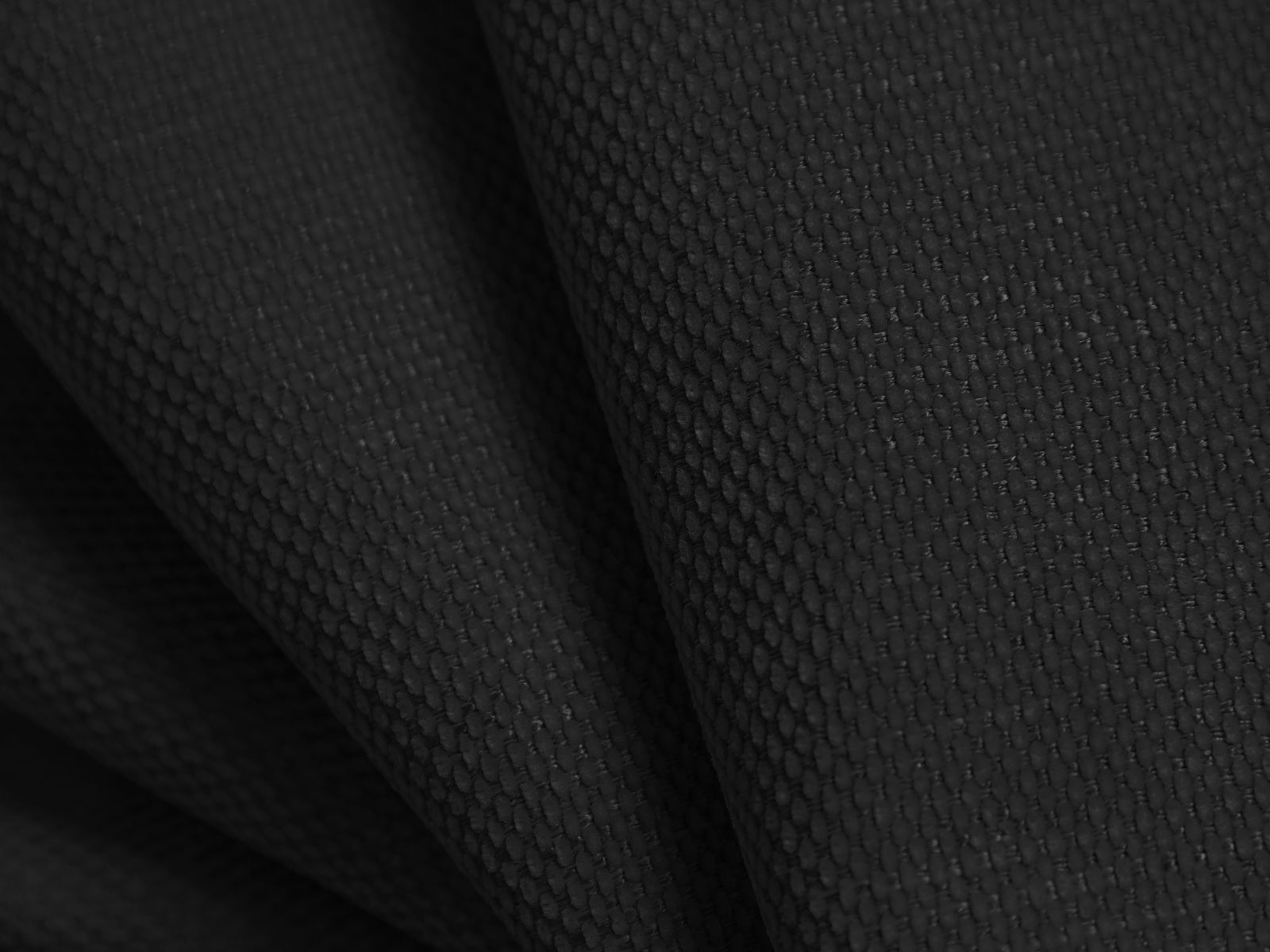 Stylischer Sessel Molino von Micadoni in edlem Schwarz, ideal für gemütliche Leseecken und moderne Wohnkonzepte.