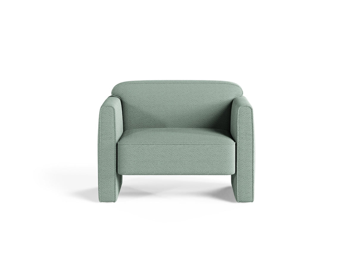 Beige Armsessel Abby von Micadoni mit strukturiertem Heritage-Stoffbezug, schwarzen Kunststoffbeinen und runder, kompakter Formgebung.