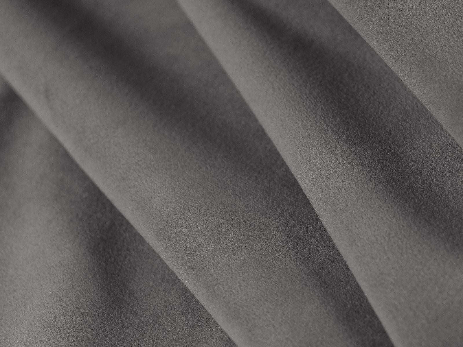 Modernes Ovalo Bett mit 180 cm hohem Kopfteil und integriertem Stauraum, in edlem Dark Grey-Magic Velvet für stilvolle Akzente im Schlafzimmer.