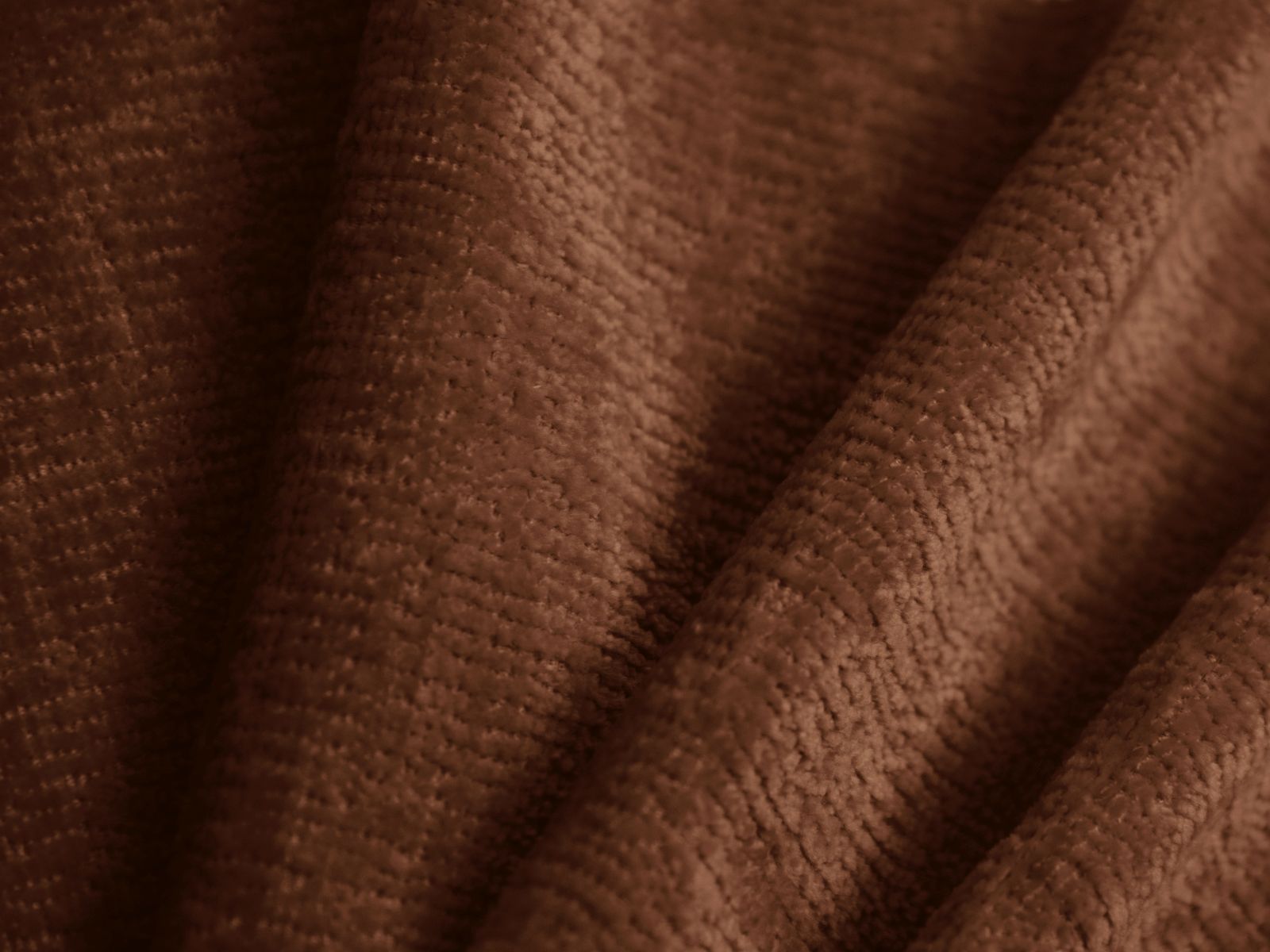 Modernes Ovalo Bett in warmem Terracotta, 180 cm Kopfteil, bietet zusätzlichen Stauraum für eine aufgeräumte Schlafumgebung.