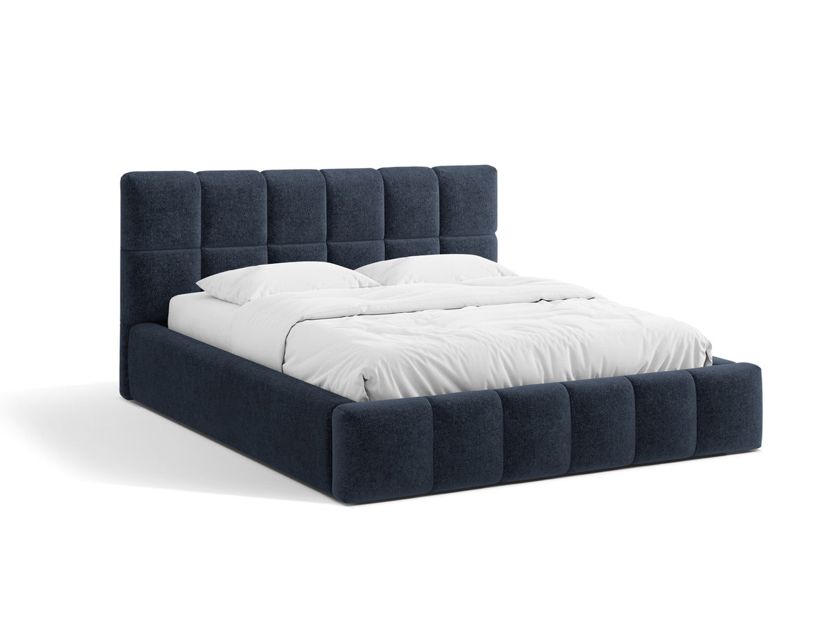 Bellis Ablagebett mit Kopfteil von Micadoni in Gelb, Bezug aus Bluvel-Stoff, schwarze Kunststoffbeine, gepolstertes Kopfteil mit Ziernähten.