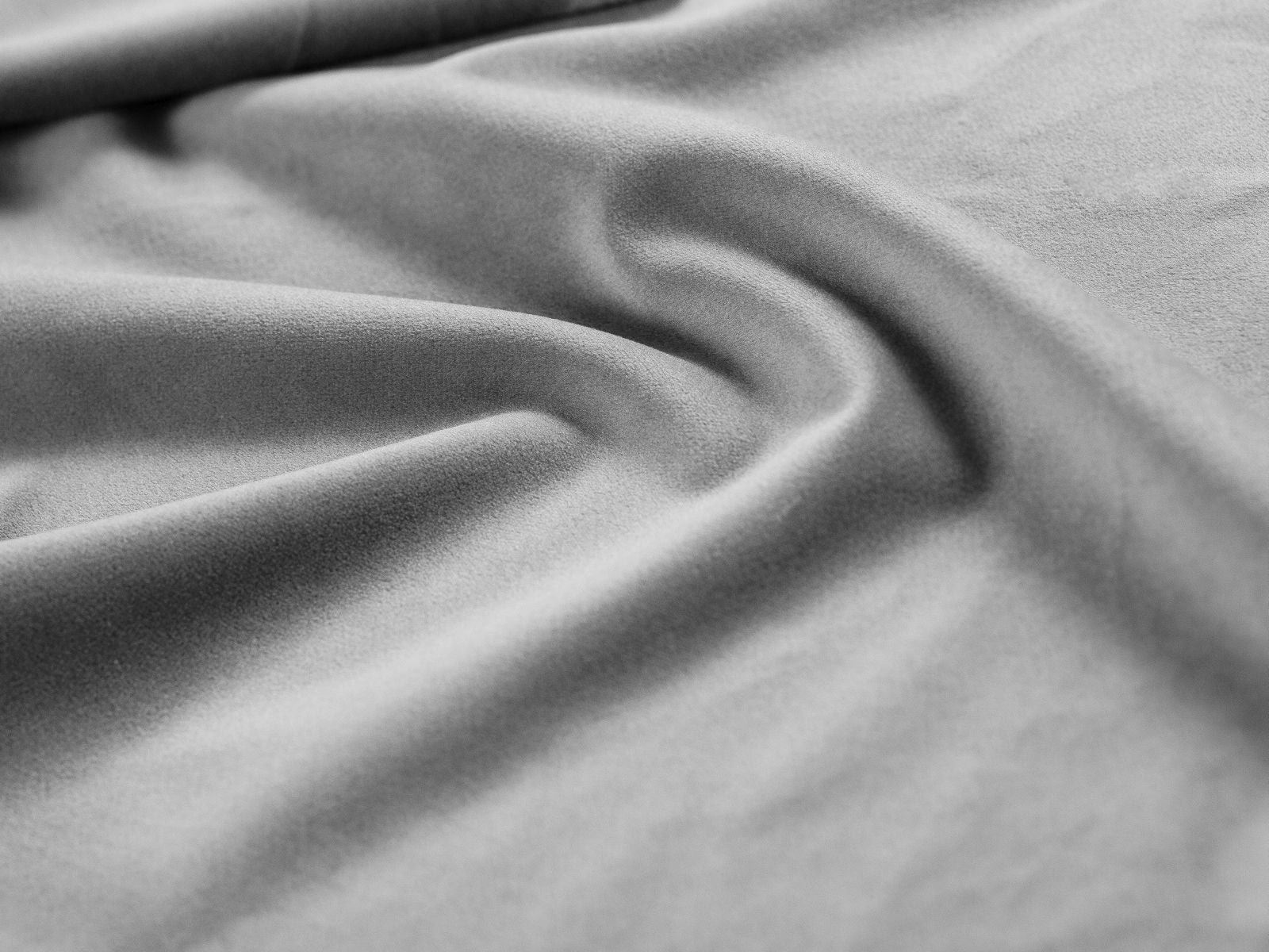 Elegantes Phaedra Bett in dezentem Grau, 90 cm, mit integriertem Stauraum und modernem Kopfteil für stilvolle Schlafzimmergestaltung.