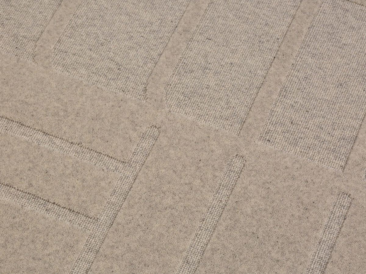 Hellgrauer Teppich Kasai von Micadoni aus Wolle, Grösse 230x160 cm, mit dichtem Flor und sauber verarbeiteten Kanten.