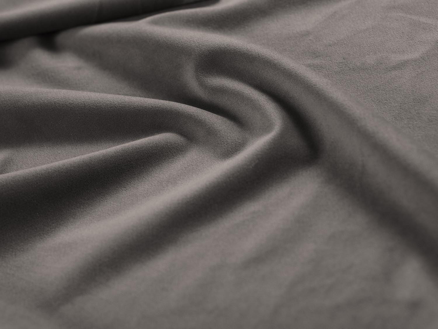 Stylisches Mamaia Velour Ecksofa für 6 Personen, ideal für gesellige Abende, vereint modernen Chic und hohen Sitzkomfort.