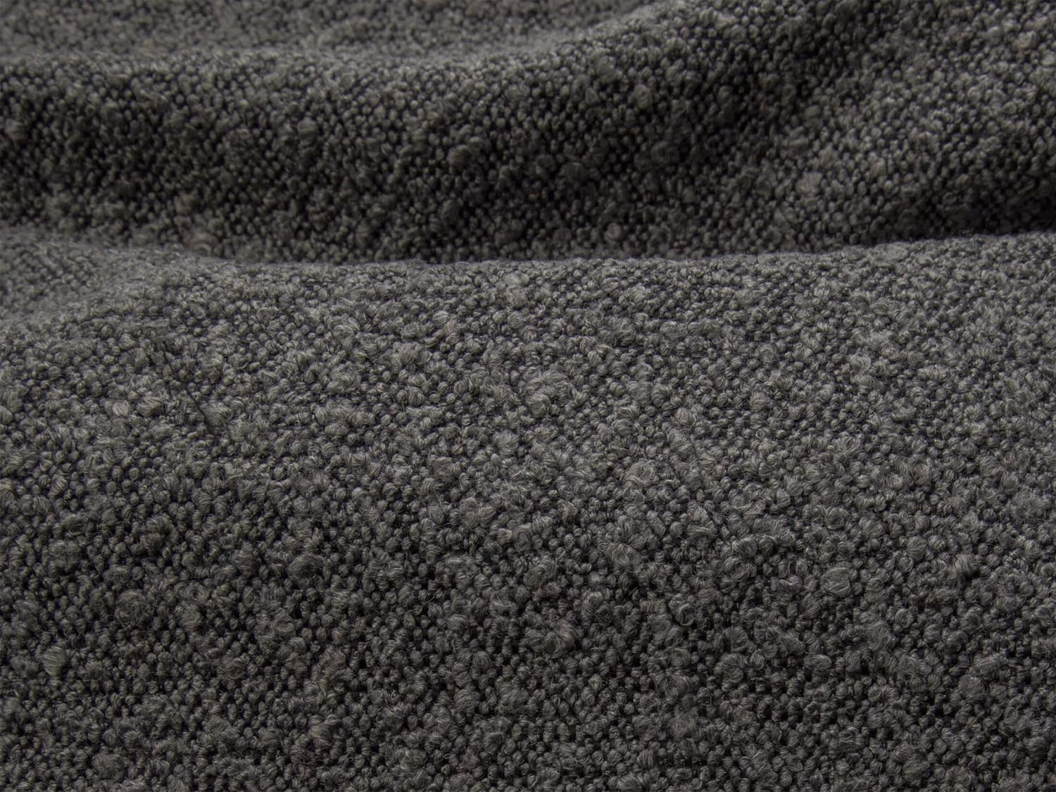 Erleben Sie das Darren Boucle Kopfteil von Micadoni – eine elegante Kombination aus modernem Design und optimalem Schlafkomfort für Ihr Schlafzimmer.