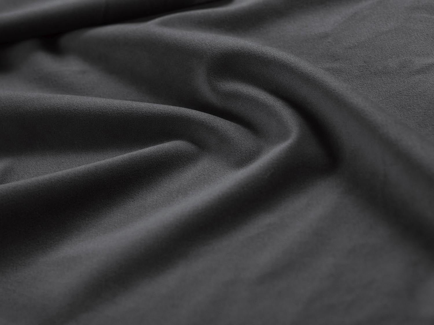 Luxuriöses Velour-Kopfteil Phaedra in sanftem Grau-Blau, perfekt für eine moderne und elegante Schlafzimmeratmosphäre.