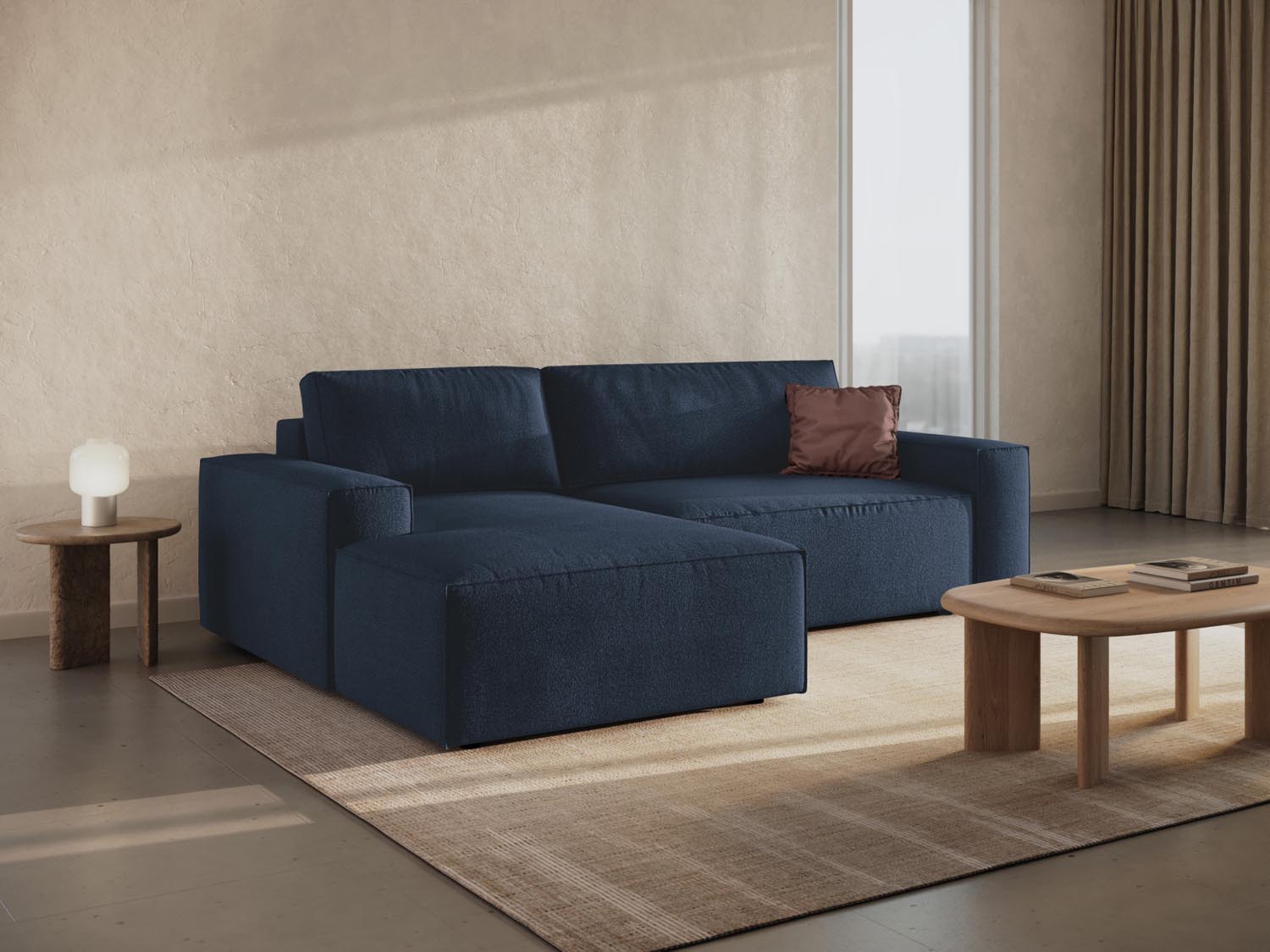 Elegantes Jodie Boucle Ecksofa in Dunkelblau, ideal für stilvolle Wohnräume, mit praktischer Schlaffunktion und Stauraum.