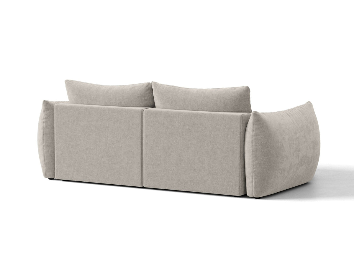 Ecksofa Bloom in Sand mit Velours-Bezug, schwarzen Kunststoffbeinen und ausklappbarer Schlaffunktion samt Bettkasten unter der Sitzfläche.