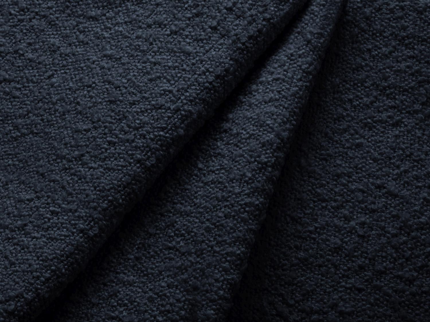 Elegantes Miley Boucle Ecksofa links für 4 Personen in tiefem Blau, ideal für einladende und moderne Wohnräume.