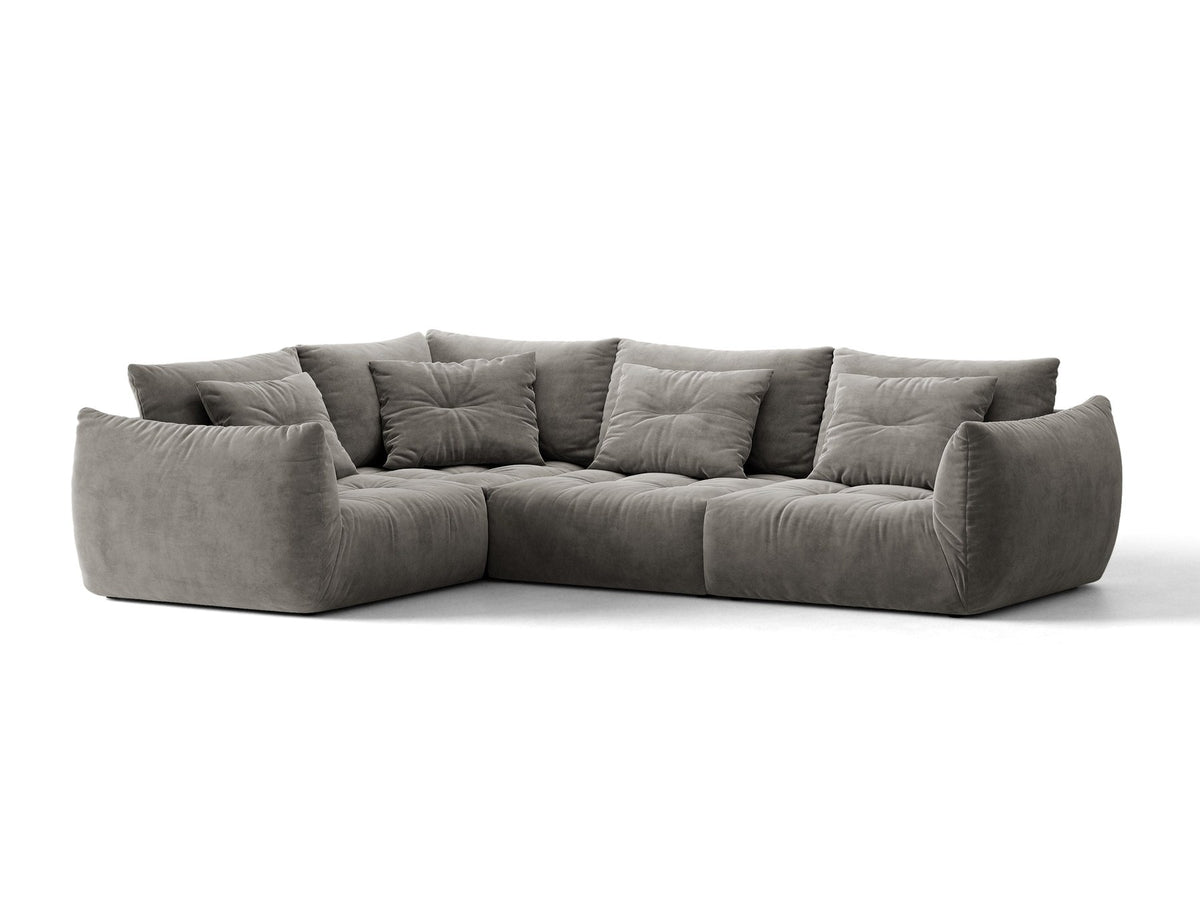 Modulares Ecksofa links Bloom von Micadoni in leichtem Beige, Veloursstoff Casino Pearl, schwarze Kunststoffbeine, tiefe Sitzfläche.