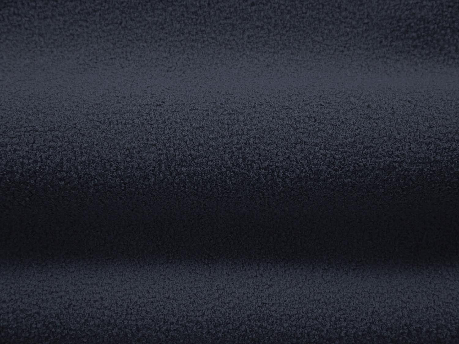 Modernes 5-Sitzer Ecksofa Jenny links in tiefem Blau, perfekt für gemütliche Wohnzimmer. Hochwertige Verarbeitung von Micadoni.