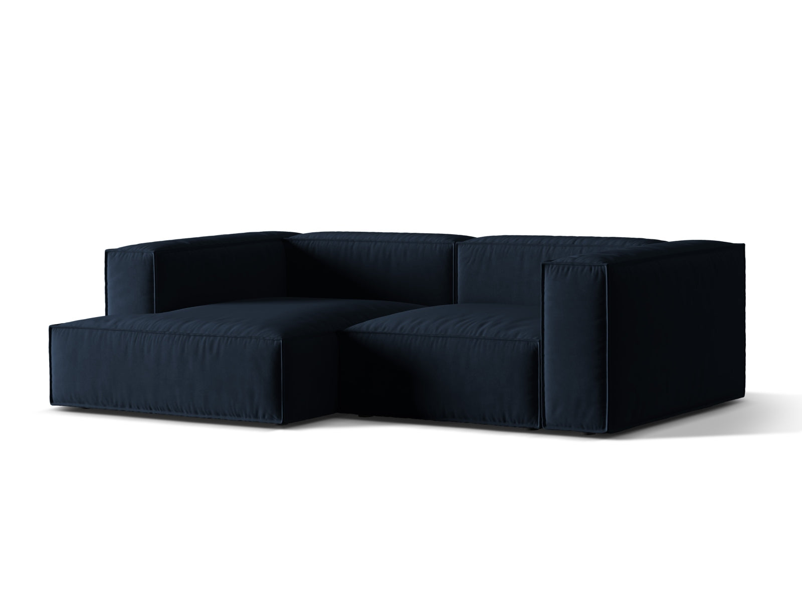 Elegantes Nuria Velour Ecksofa in Dunkelblau, modular und linksseitig, ideal für stilvolle Wohnräume. Hochwertige Verarbeitung von Micadoni.