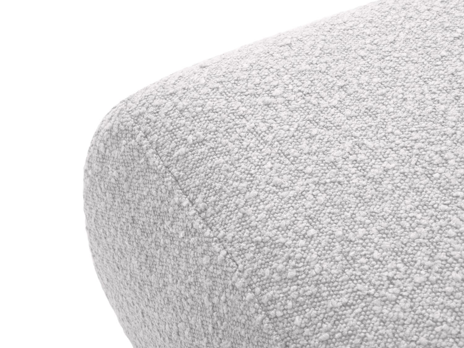 Eleganter Molino Boucle Pouf in sanftem Grau, vielseitig einsetzbar als bequemer Sitz oder stilvolles Wohnaccessoire.
