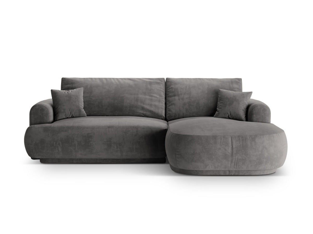 Ecksofa in Leichtes Beige mit Veloursbezug, ausgeklappter Bettfunktion, Stauraumfach und schwarzen Kunststoffbeinen von Micadoni.