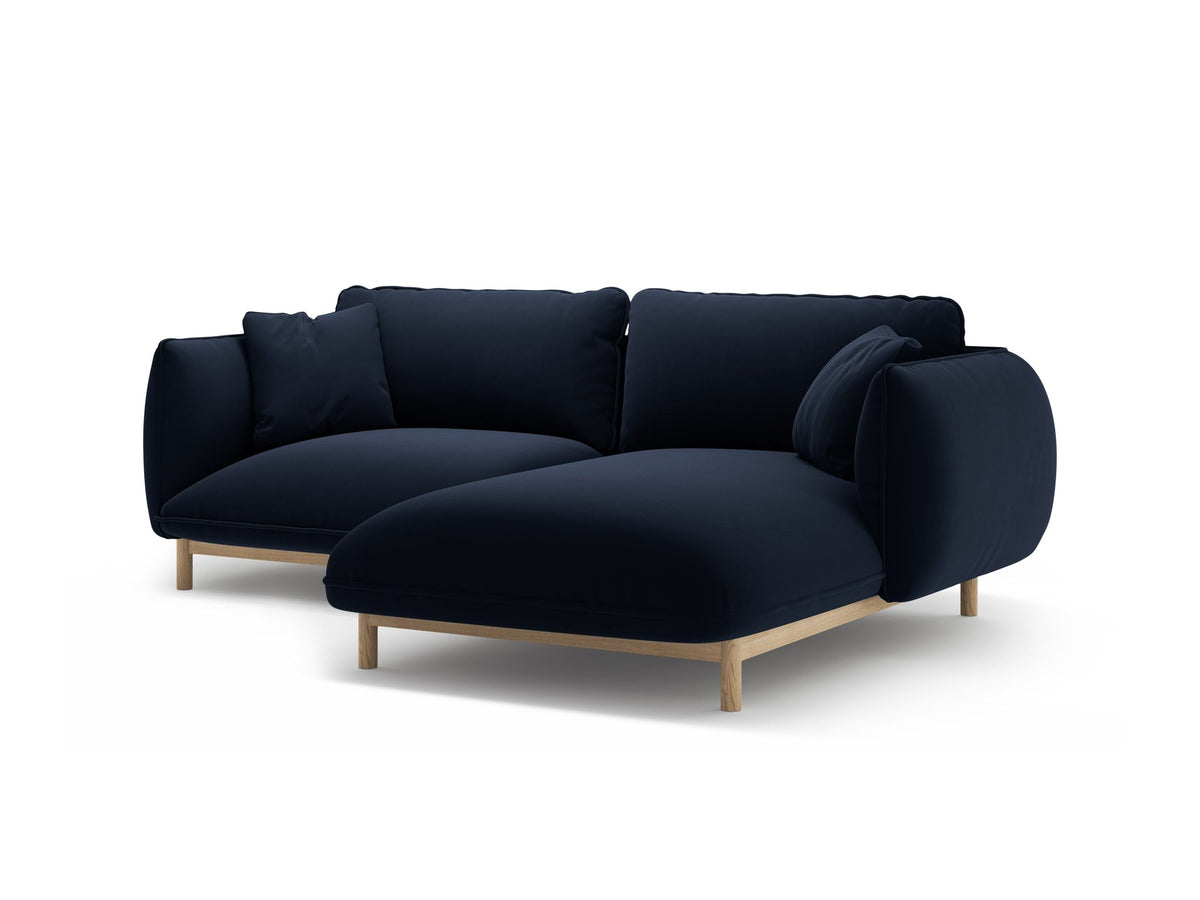 Foto des Ada Linkes Ecksofa von Micadoni in Mandel beige: L-Sofa mit rundem Armlehnen-Design, Buchenholzbeinen und Velours-Bezug Casino Lion.
