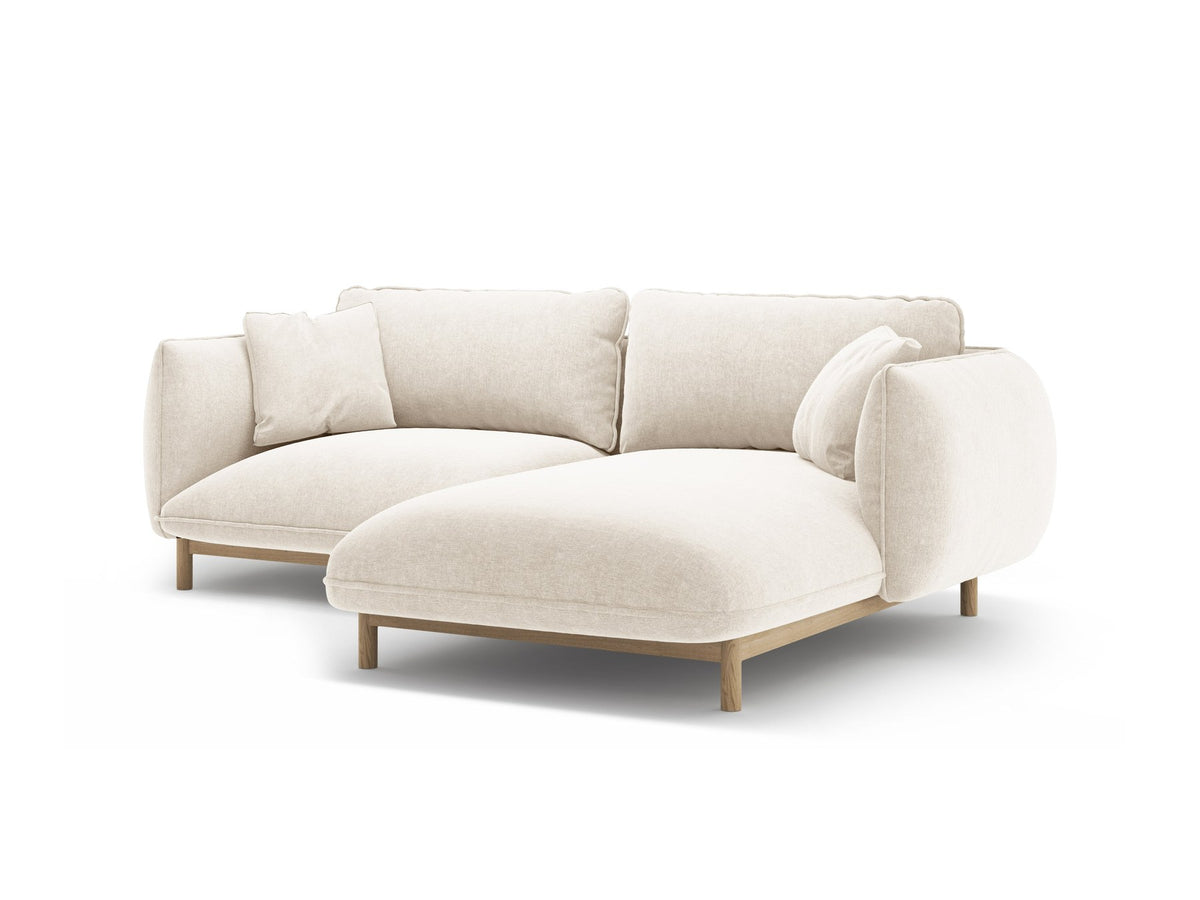 Foto des Ada Linkes Ecksofa von Micadoni in Mandel beige: L-Sofa mit rundem Armlehnen-Design, Buchenholzbeinen und Velours-Bezug Casino Lion.