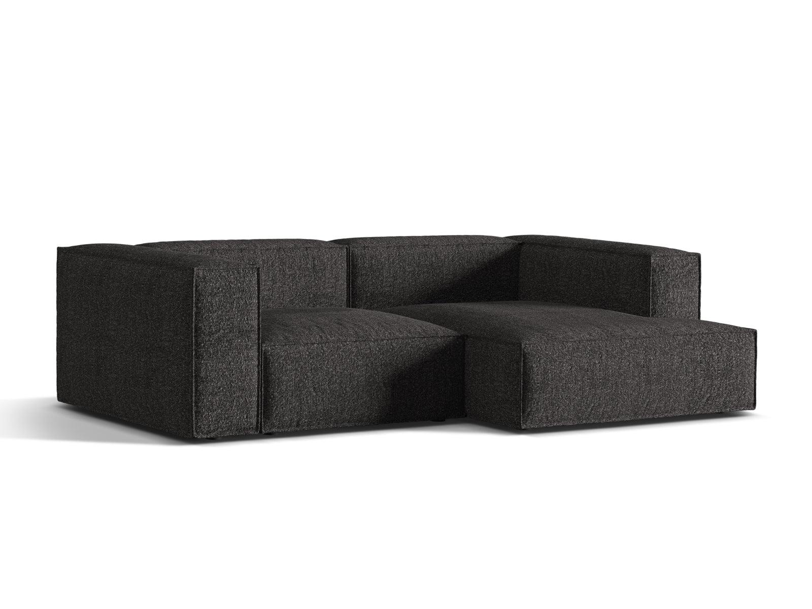 Elegantes Nuria Boucle Modular Ecksofa in Anthrazit, ideal für stilvolle Wohnräume. Komfortables 3-Sitzer L-Sofa von Micadoni.