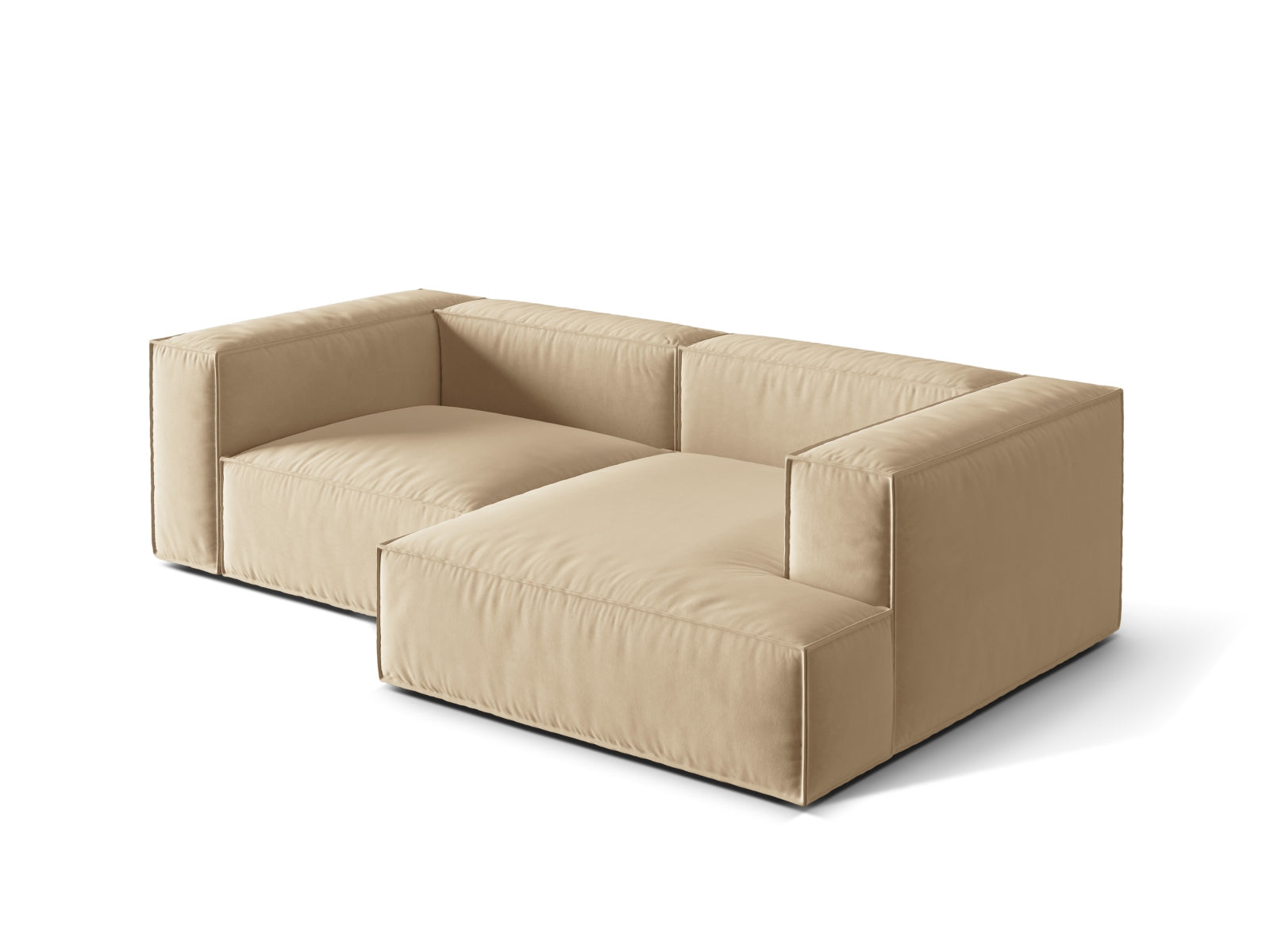 Modulares Nuria Velour Ecksofa in zartem Nude, bietet Komfort und Stil für jedes Wohnzimmer. Ideal für gesellige Abende und entspannte Momente.