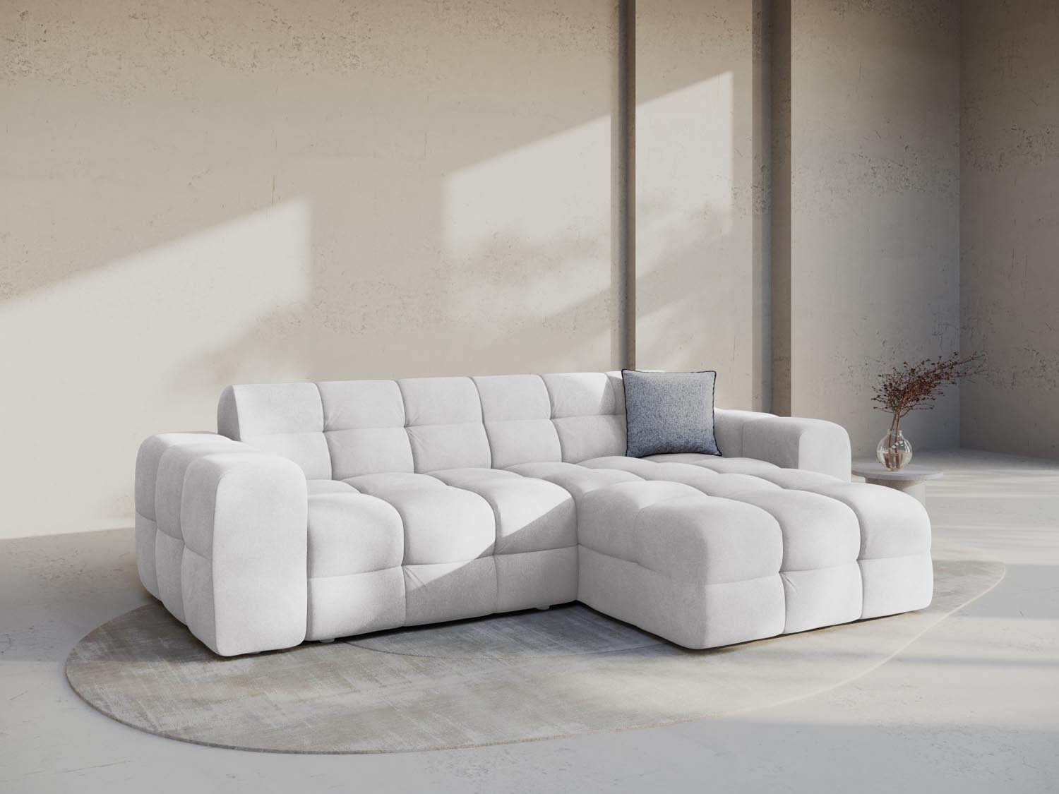 Elegantes Kendal Velour Ecksofa in hellem Grau, ideal für stilvolle Wohnräume. Komfortables 4-Sitzer Design von Micadoni.