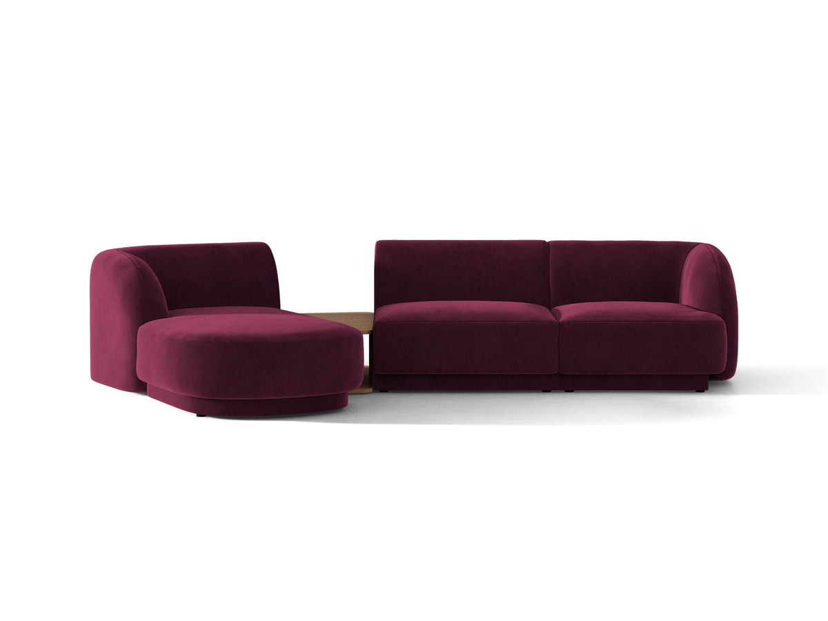 Braunes modulares Sofa Miley von Micadoni mit Bouclé-Stoff, schwarzen Kunststoffbeinen und breiter Sitzfläche im Wohnraum.