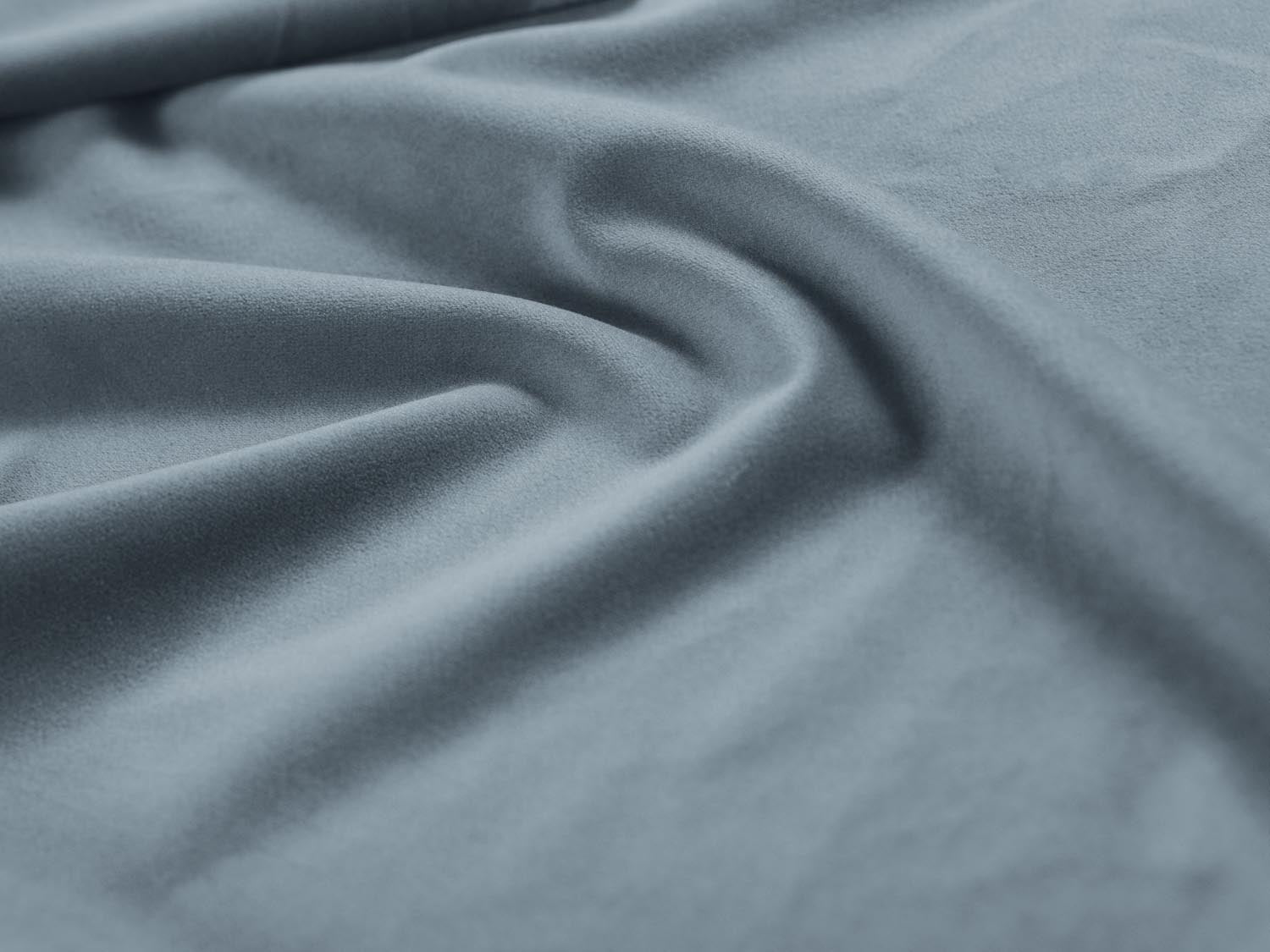 Luxuriöses 9-Sitzer Velour Ecksofa Mamaia in ansprechendem Blau, perfekt für entspannte Stunden und stilvolle Einrichtung.