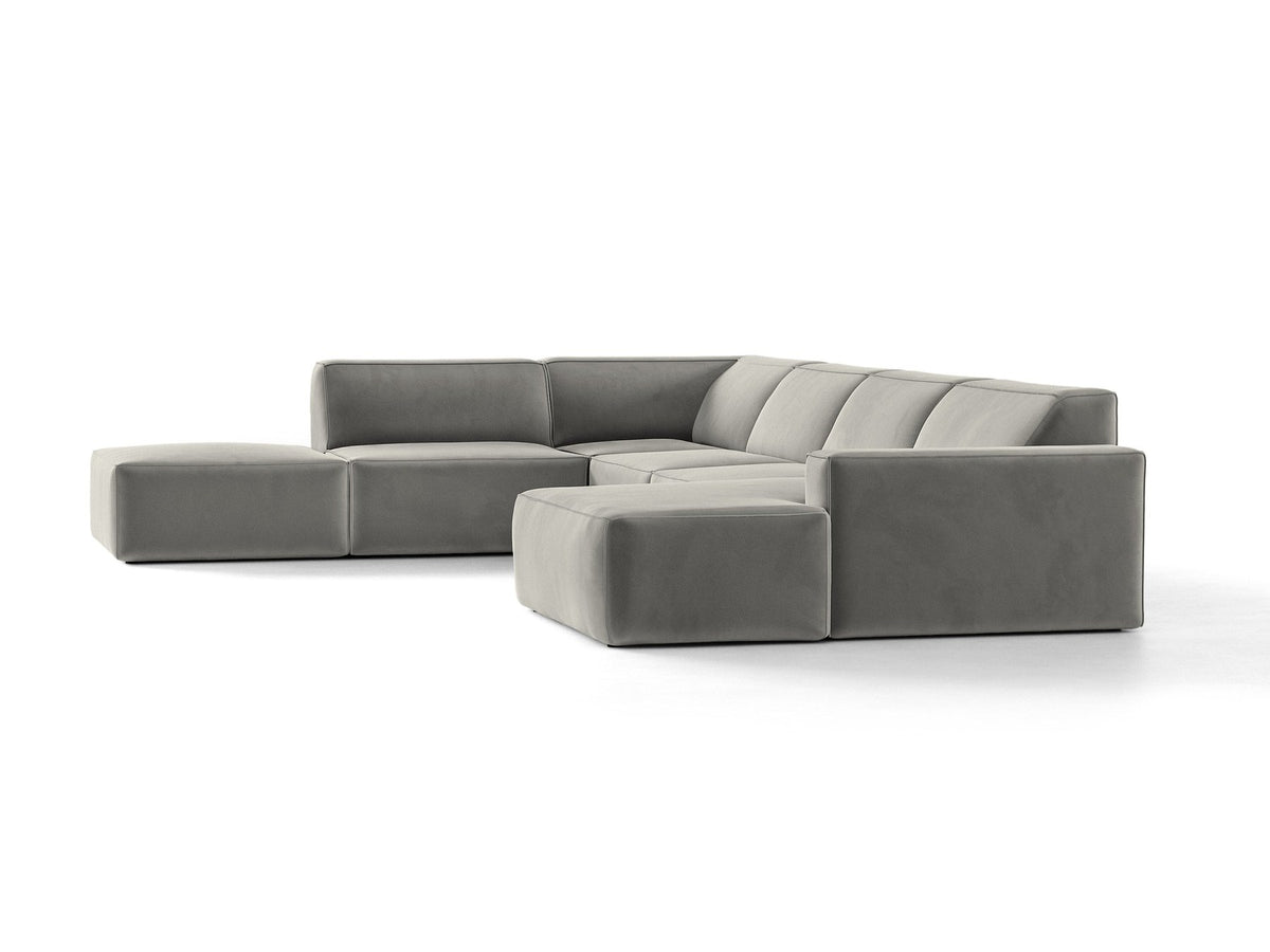 Modulares Ecksofa links Jodie von Micadoni in leichtem Beige mit Venus-Samtstoff, schwarzen Kunststoffbeinen und Panoramaform.
