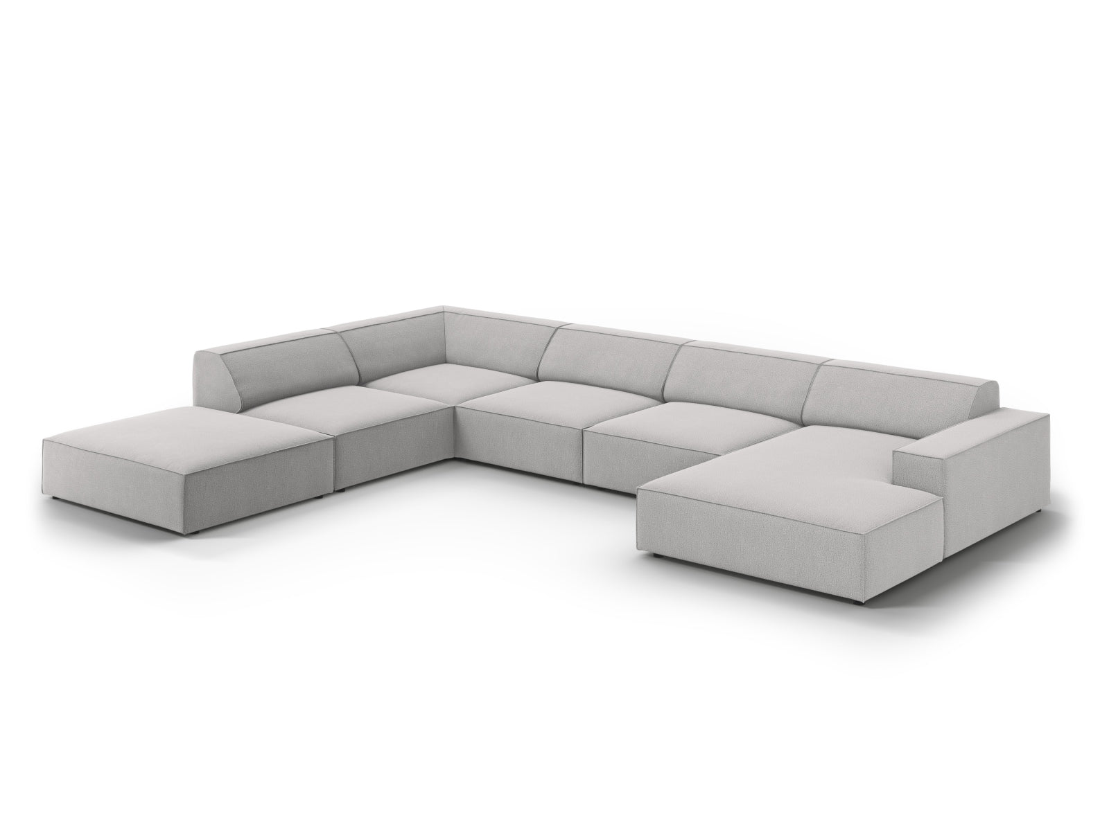 Elegantes, modulares 7-Sitzer Ecksofa Jodie in sanftem Grau, perfekt für stilvolle Wohnzimmer und gemütliche Zusammenkünfte.