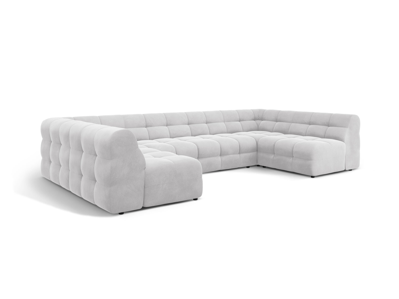 Modernes Kendal Velour Panoramic Sofa für 7 Personen in hellem Grau, perfekt für gesellige Runden und entspannte Stunden im Wohnzimmer.