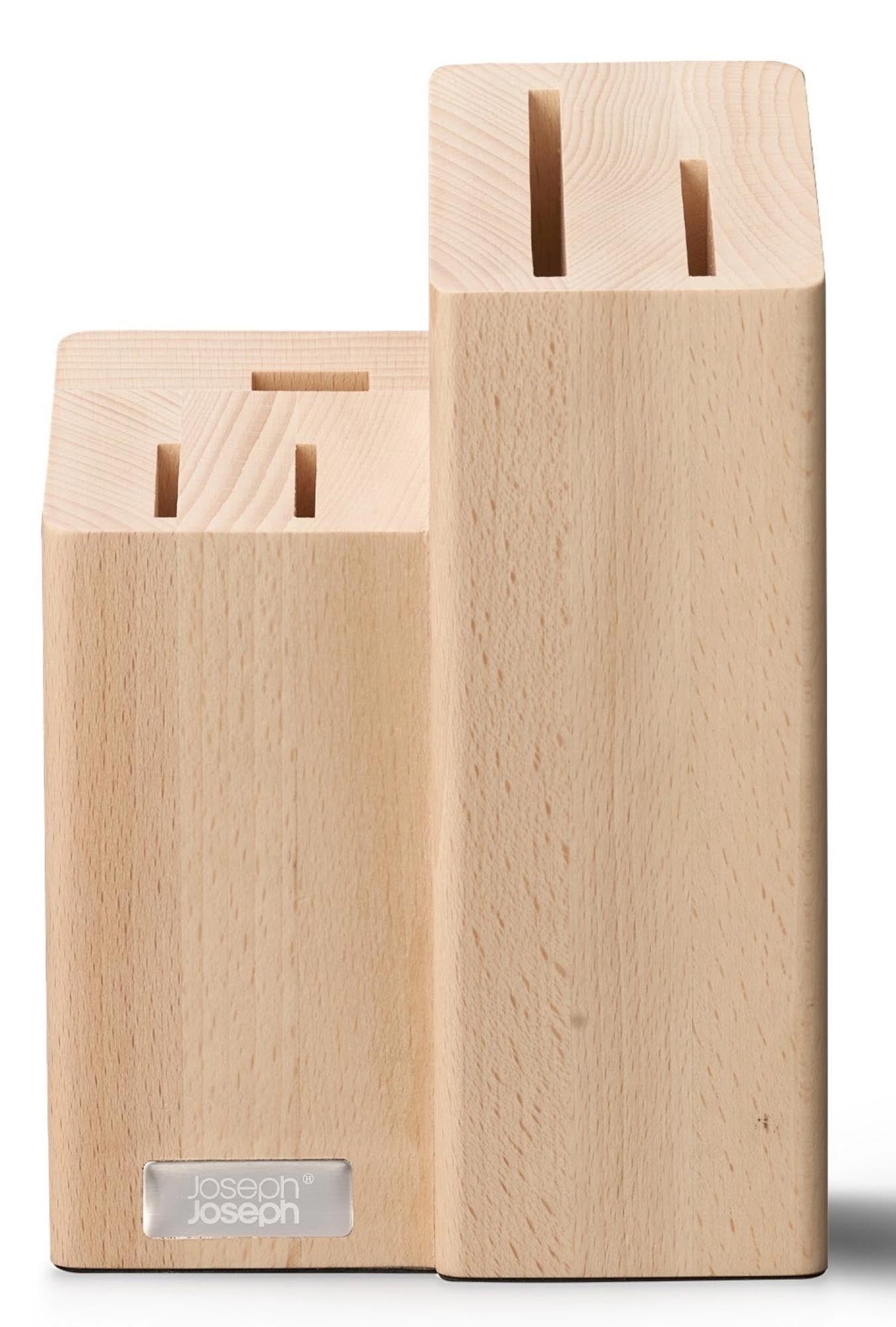 Ein stilvolles Set aus 5 Messern und einer Schere mit innovativem Design, ideal für präzises Schneiden in der Küche.