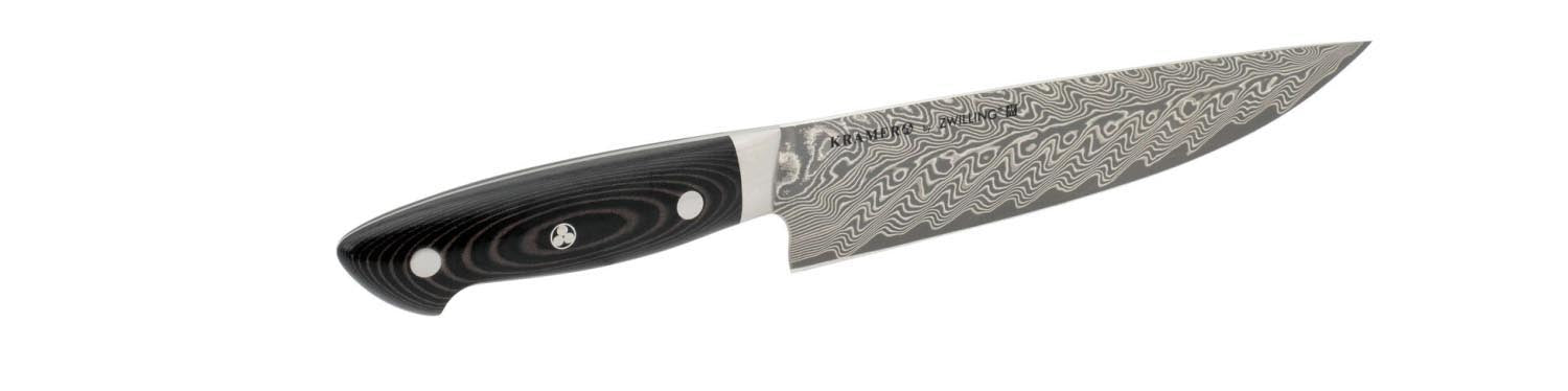 Das 20cm Kramer Euro Stainless Kochmesser von Zwilling vereint Präzision, Langlebigkeit und ein elegantes Erscheinungsbild.