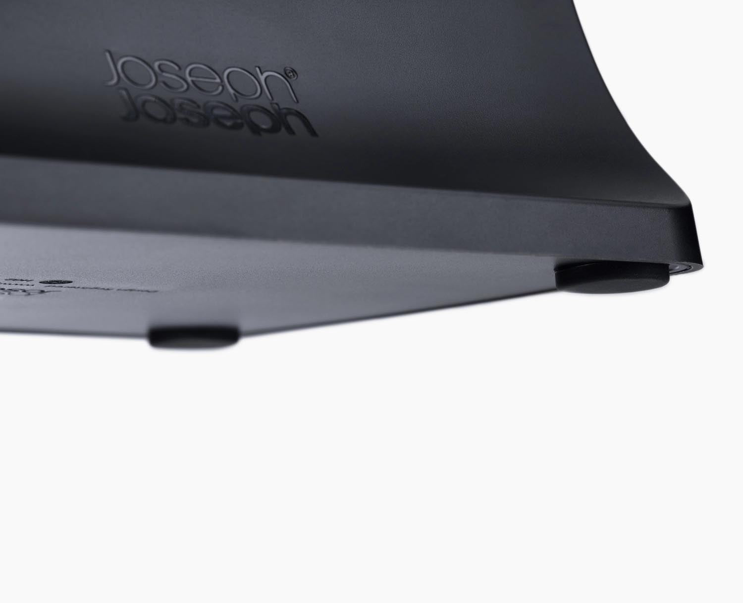 Kompakter Pfannendeckelhalter aus langlebigem ABS, Masse 20x16.5x7.5 cm, von Joseph Joseph. Perfekt für eine aufgeräumte Küche.