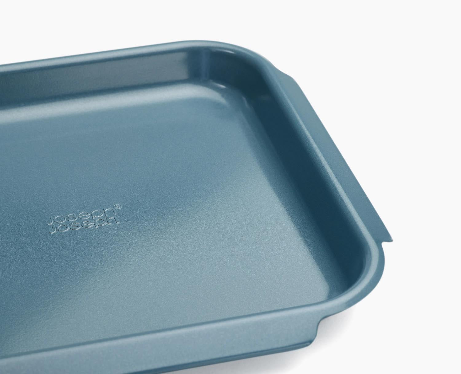 Antihaftbeschichtete Backform Nest Bake M von Joseph Joseph, 30x33cm, 3cm hoch, ideal für gleichmässiges Backen und einfache Reinigung.