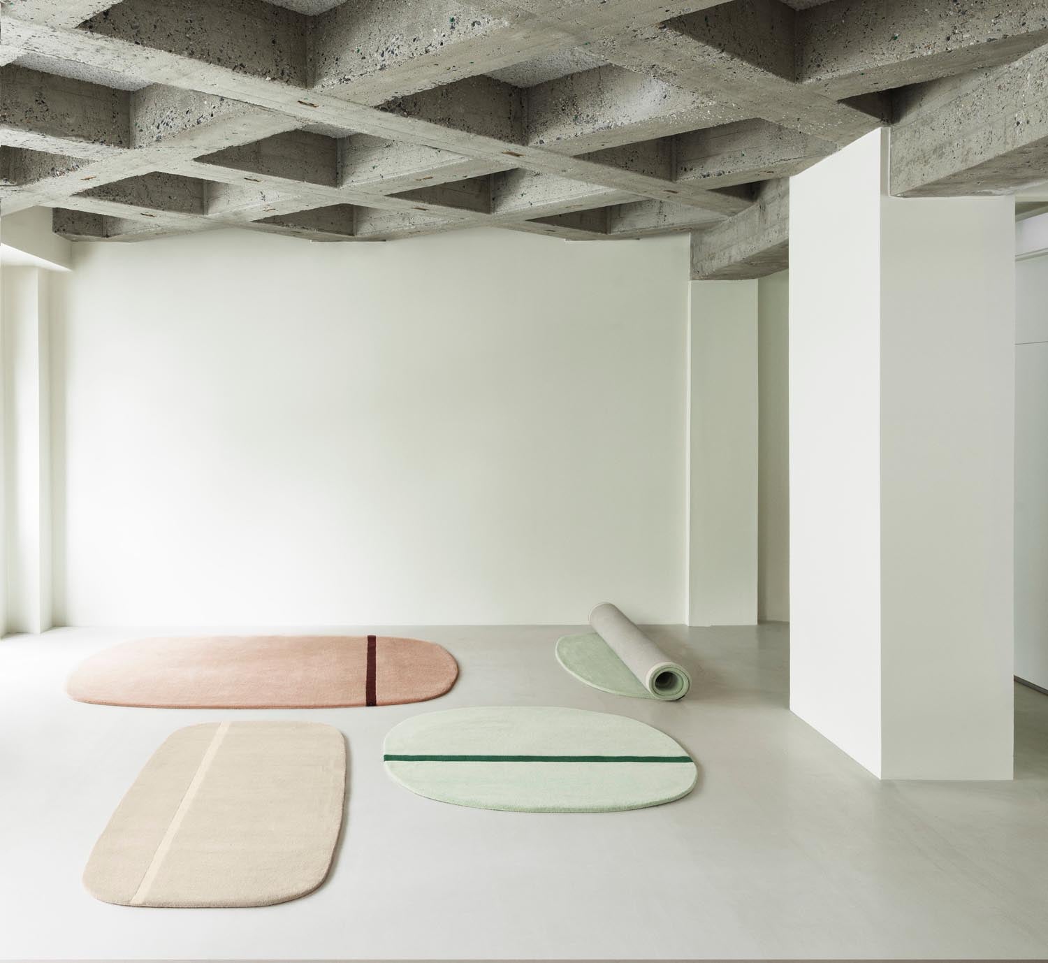 Entdecken Sie den Oona Teppich von Normann Copenhagen: Ein elegantes, handgefertigtes Design aus neuseeländischer Wolle für jeden Raum.